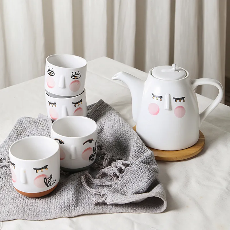 Custom Ceramic Tea Set Abstract Face Design with 3D Relief Mugs2
